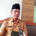 261020